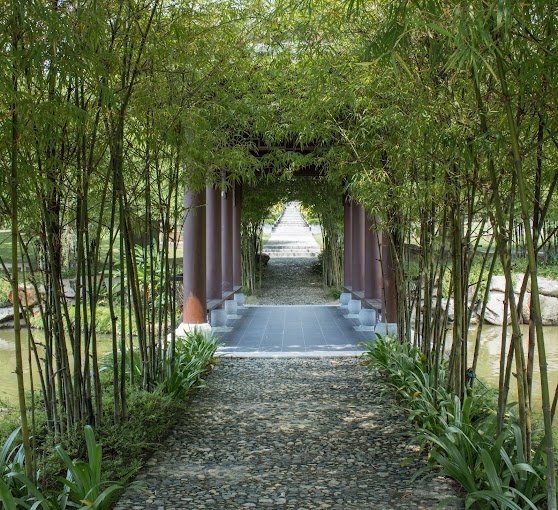 Bamboo-lined passage in the Shi Wai Tao Yuan garden at Nirvana Semenyih