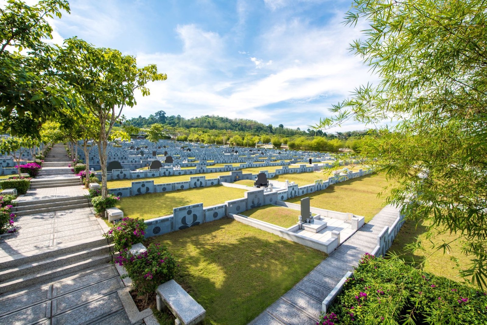 Landscaped Nirvana burial plots surrounded by greenery
