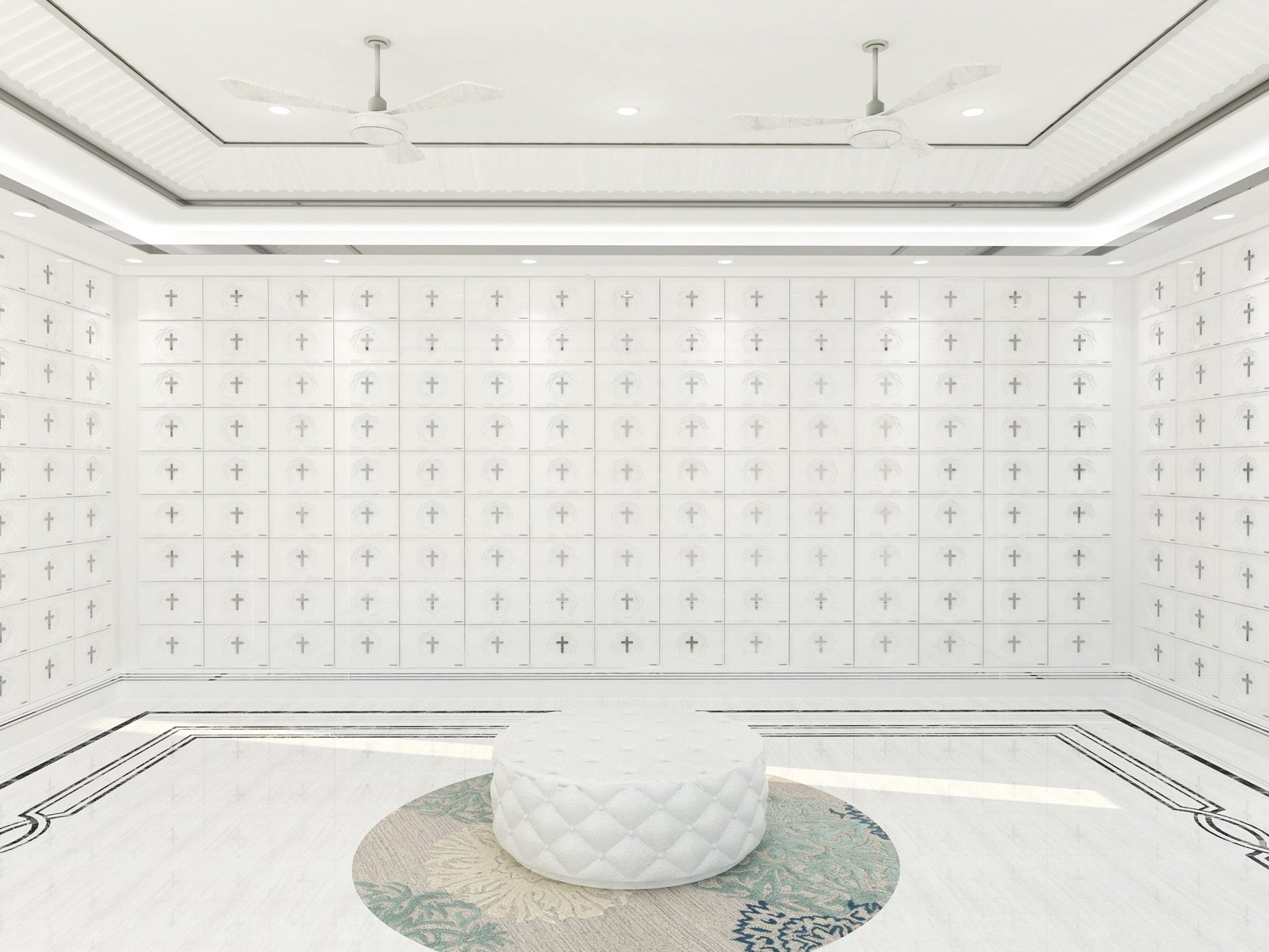 Bright white Christian columbarium with cross-marked niches and a central visitor seat